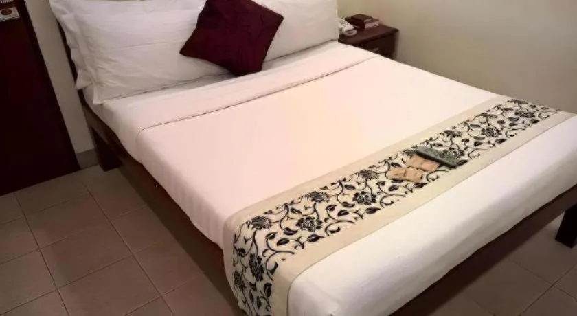 Bed in Naga Land Hotel