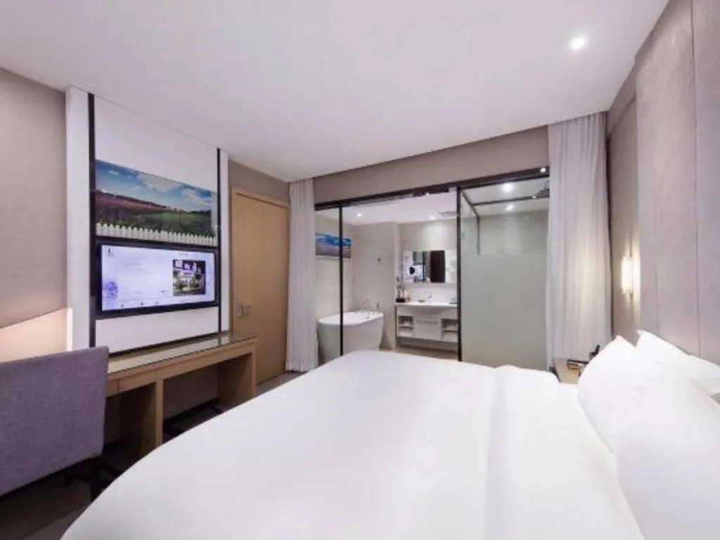Bed in Lavande Hotels·Qingyuan Jinbiwan