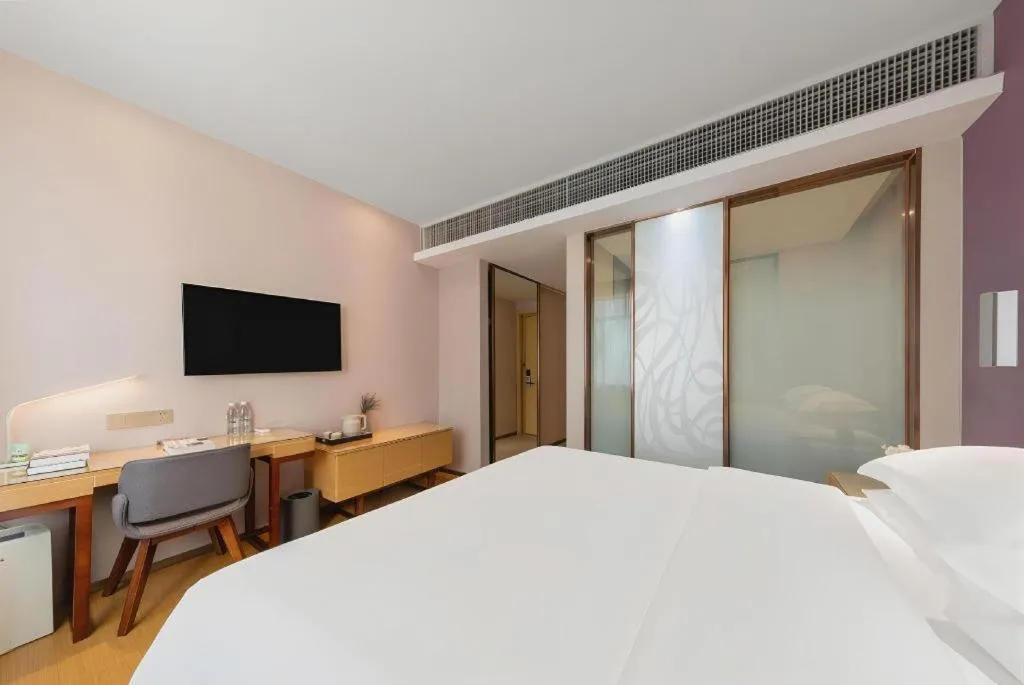 Bed in Lavande Hotel Zhongshan Dayong Rosewood Cultural Expo City