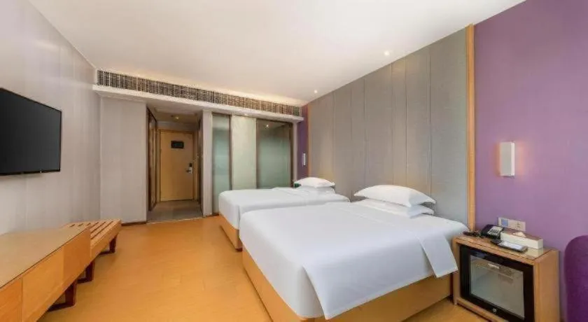 Bed in Lavande Hotel Zhongshan Dayong Rosewood Cultural Expo City