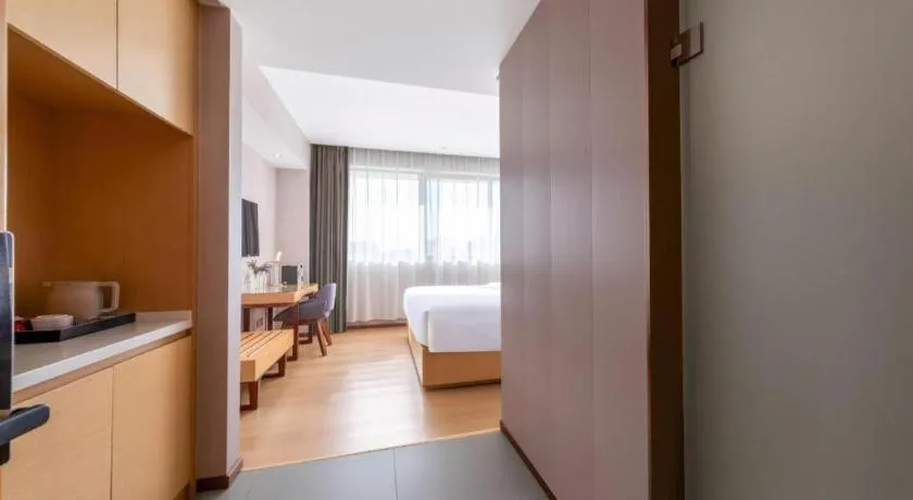 Bed in Lavande Hotel Zhongshan Dayong Rosewood Cultural Expo City