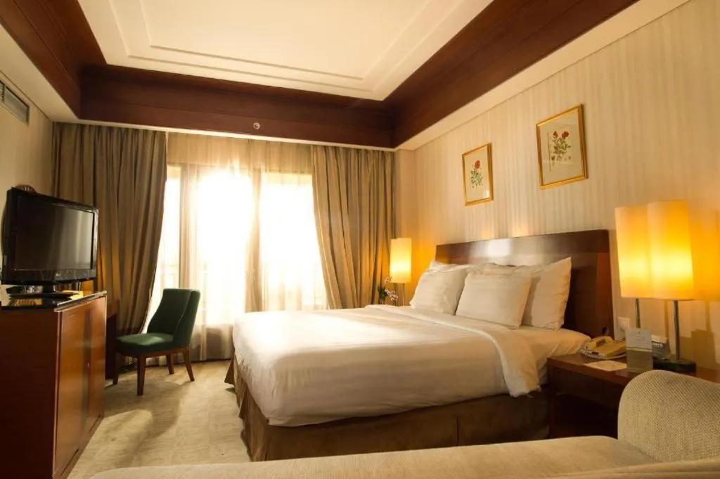 Bed in Labersa Grand Hotel &Convention Center