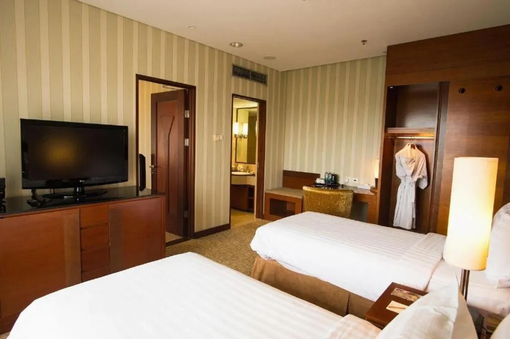 Bed in Labersa Grand Hotel &Convention Center