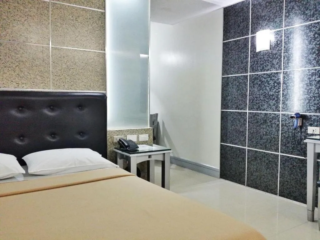 Bed in Jardin de Rosal Hotel