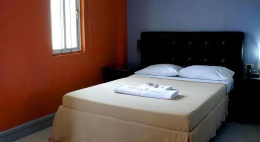 Bed in Jardin de Rosal Hotel