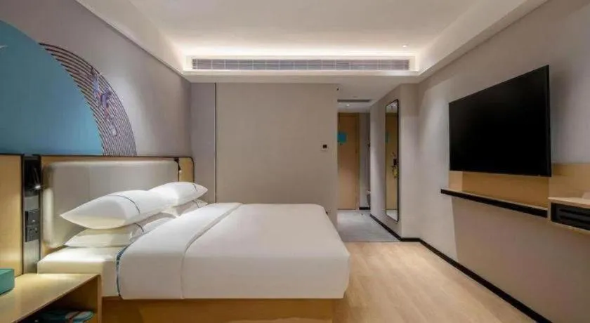 Bed in City Comfort Inn Wuhan Jiangxia