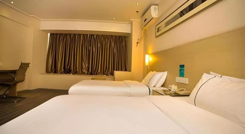 Bed in City Comfort Inn Wuhan Jiangxia