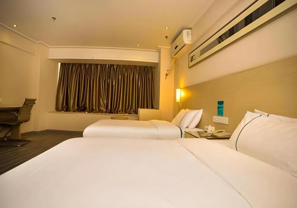 Bed in City Comfort Inn Wuhan Jiangxia