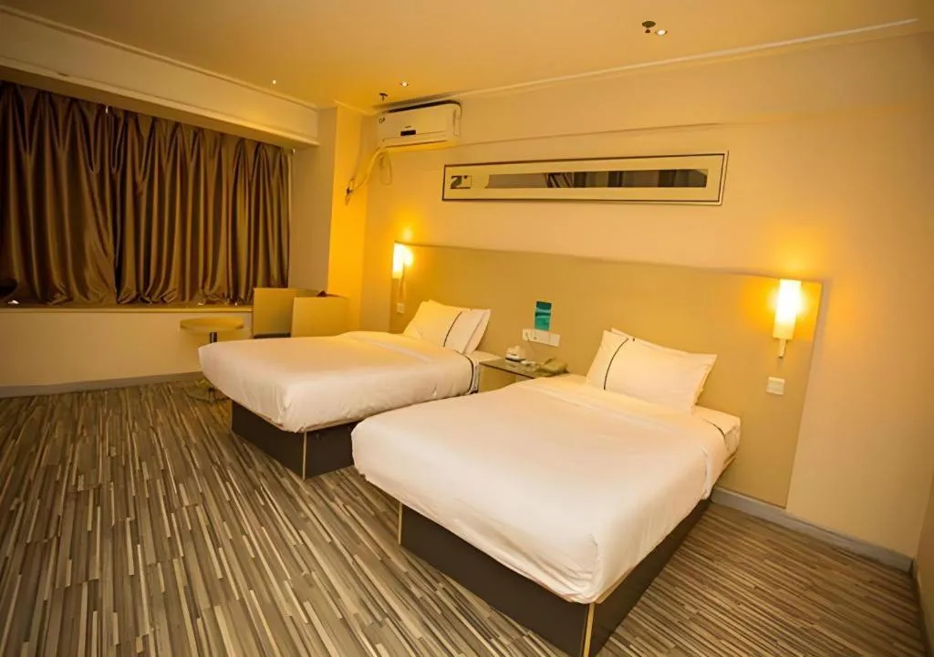 Bed in City Comfort Inn Wuhan Jiangxia