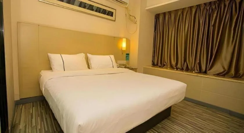 Bed in City Comfort Inn Wuhan Jiangxia
