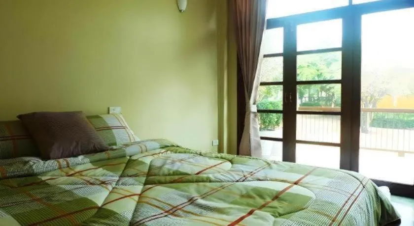 Bed in Doembang Villa