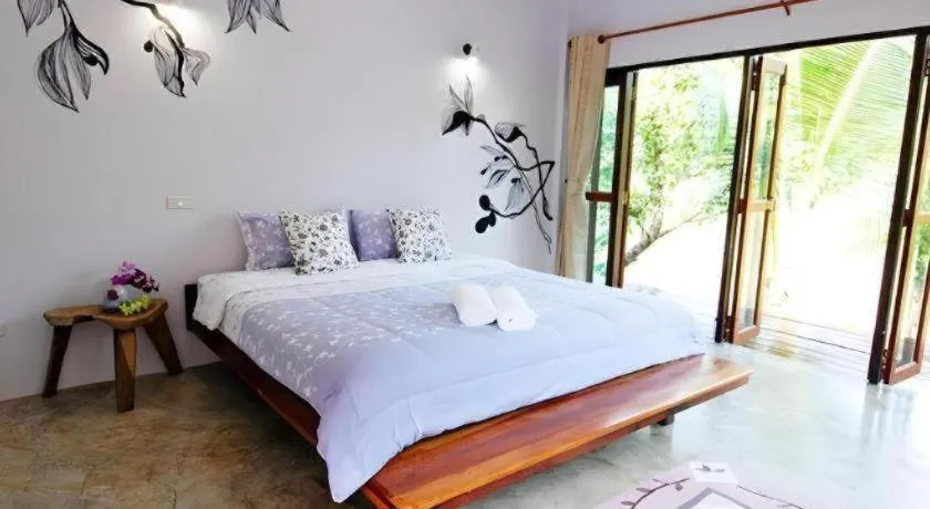 Bed in Doembang Villa