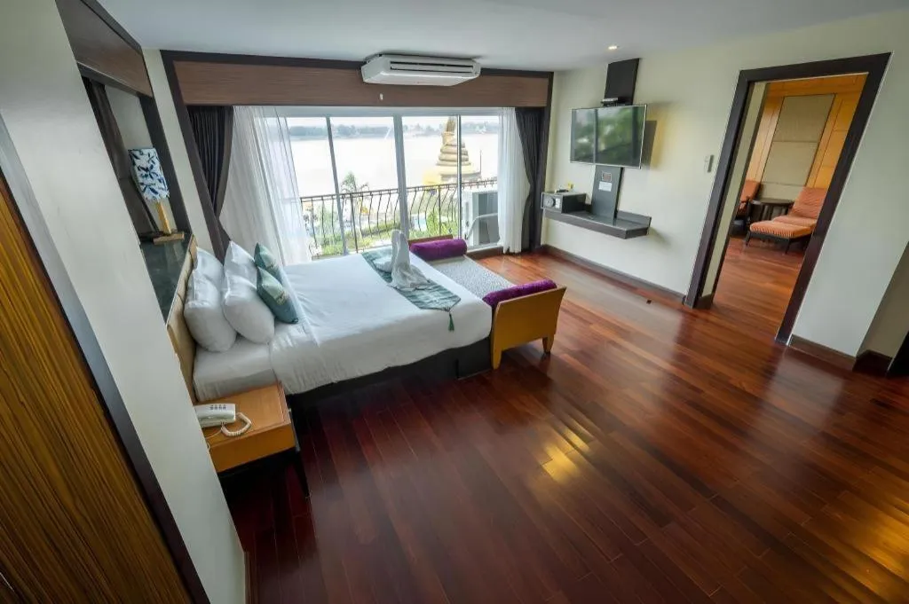 Bed in LANDMARK NAKHONPHANOM HOTEL