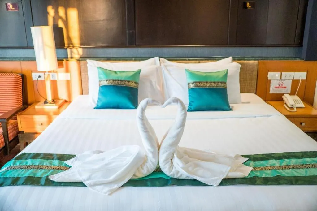 Bed in LANDMARK NAKHONPHANOM HOTEL