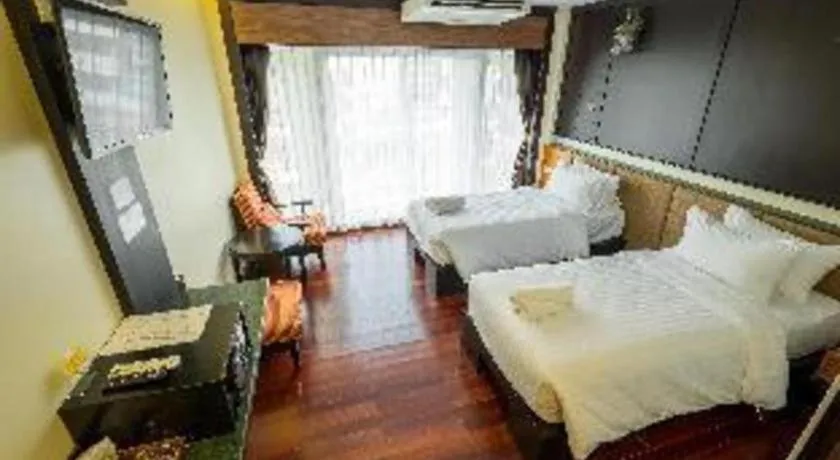 Bed in LANDMARK NAKHONPHANOM HOTEL