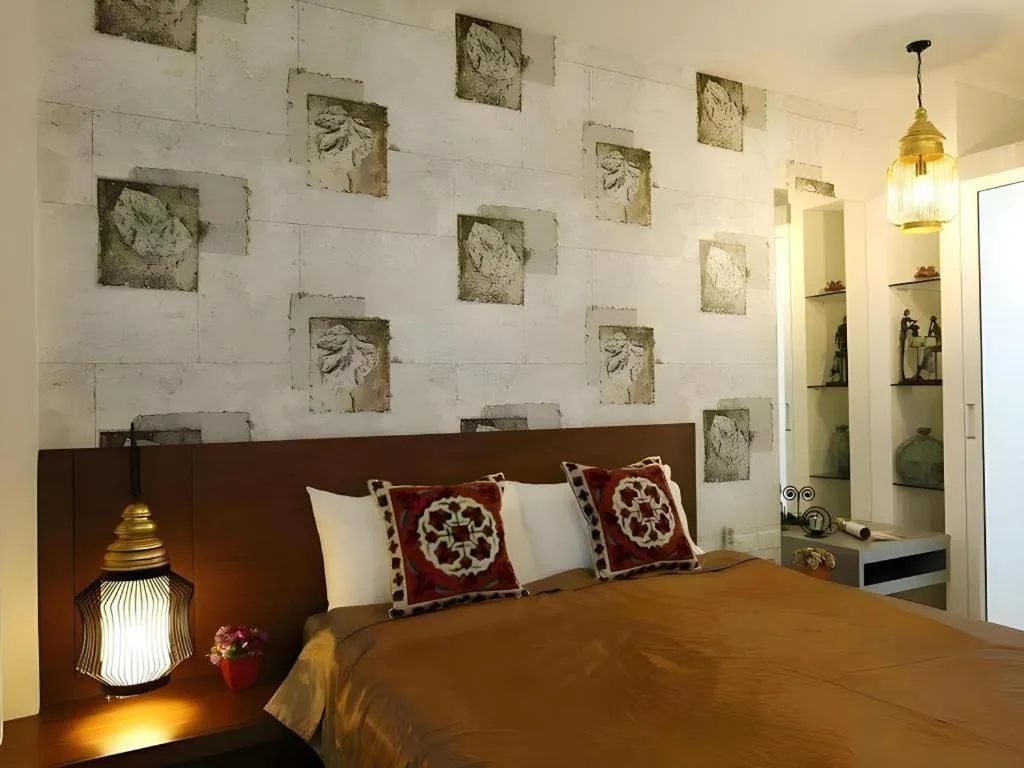 Bed in The Xym Hotel