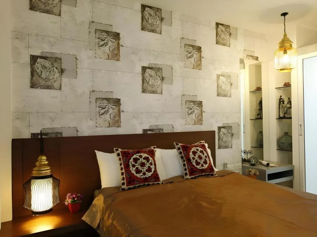 Bed in The Xym Hotel