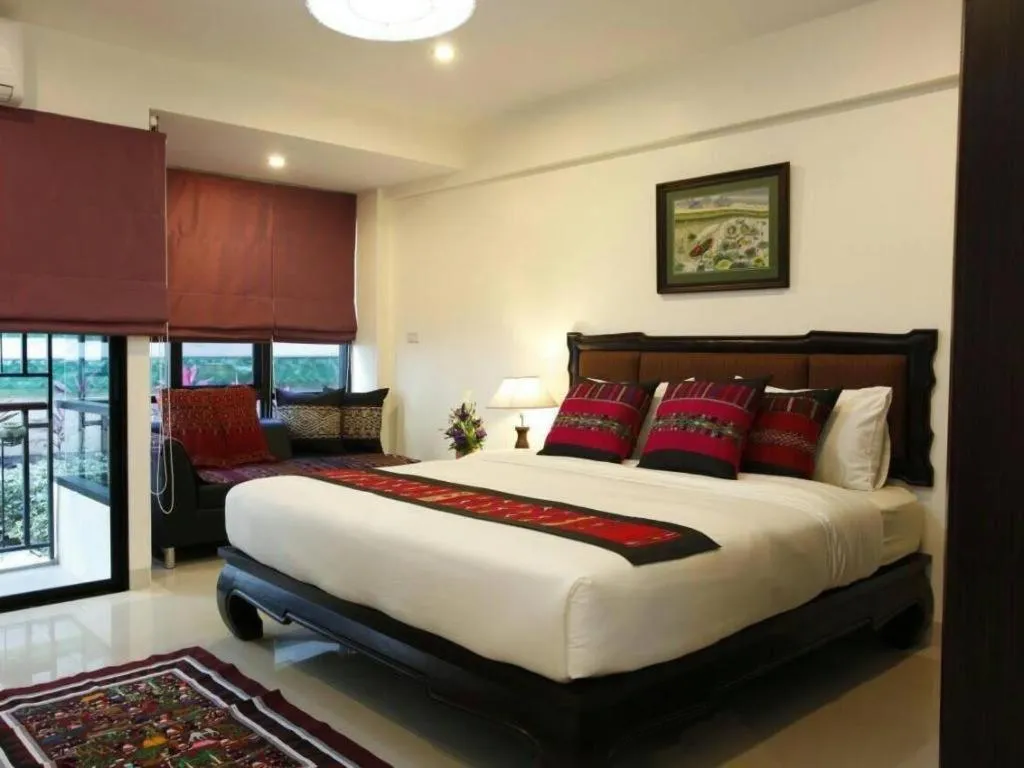 Bed in The Xym Hotel