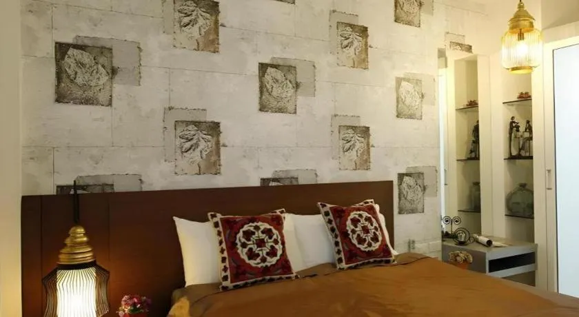 Bed in The Xym Hotel