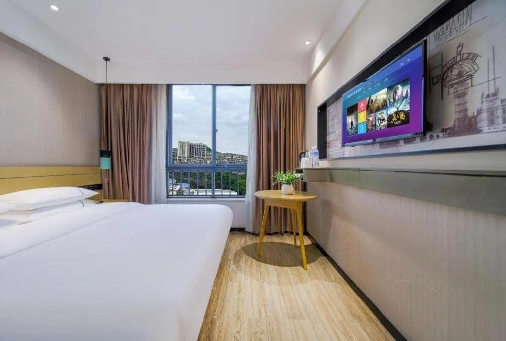 Bed in City Comfort Inn Chongqing Jiangbei Airport T3 Terminal