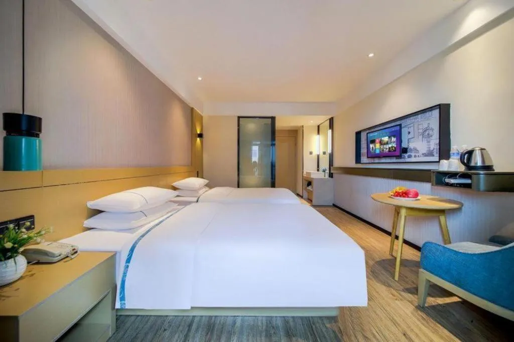 Bed in City Comfort Inn Chongqing Jiangbei Airport T3 Terminal