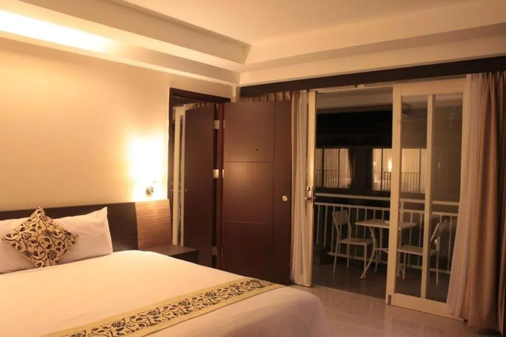 Bed in Losari Sunset Hotel