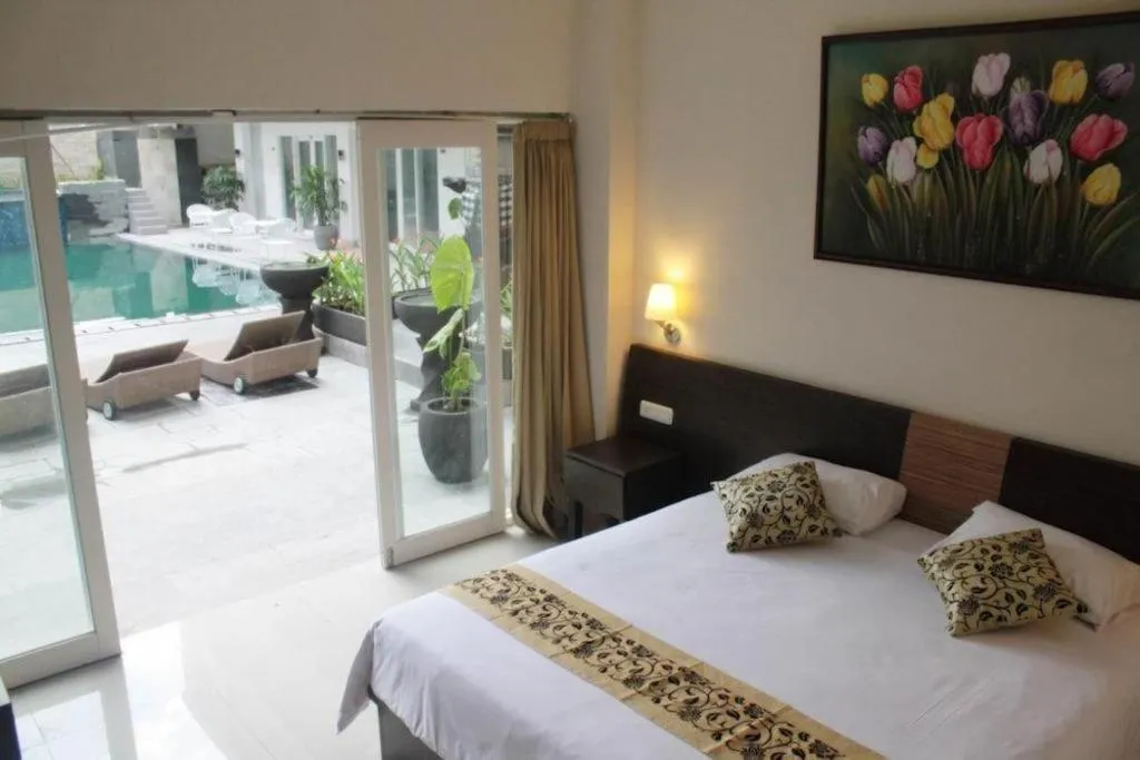 Bed in Losari Sunset Hotel