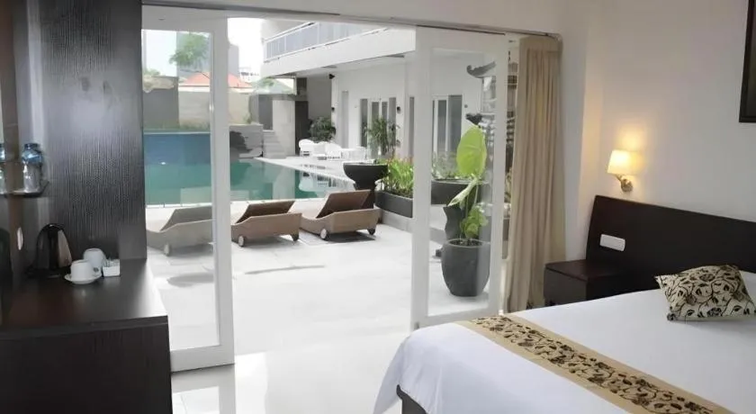 Bed in Losari Sunset Hotel