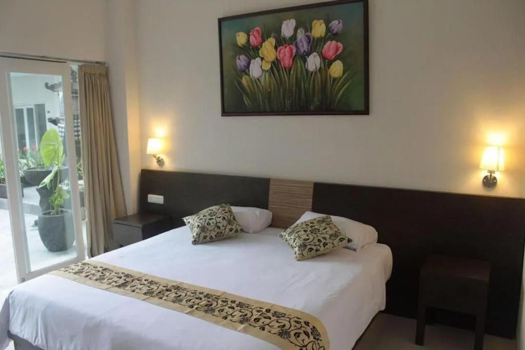 Bed in Losari Sunset Hotel