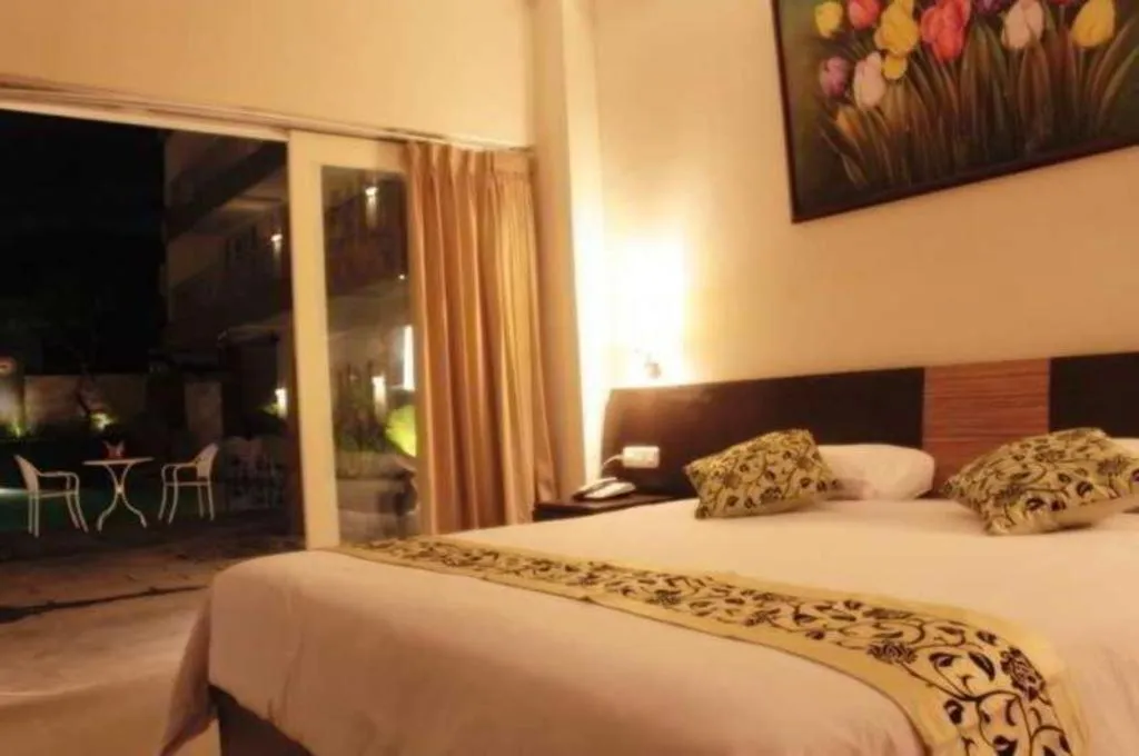 Bed in Losari Sunset Hotel