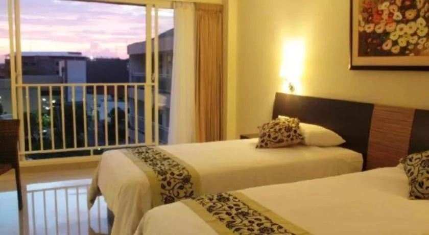 Bed in Losari Sunset Hotel