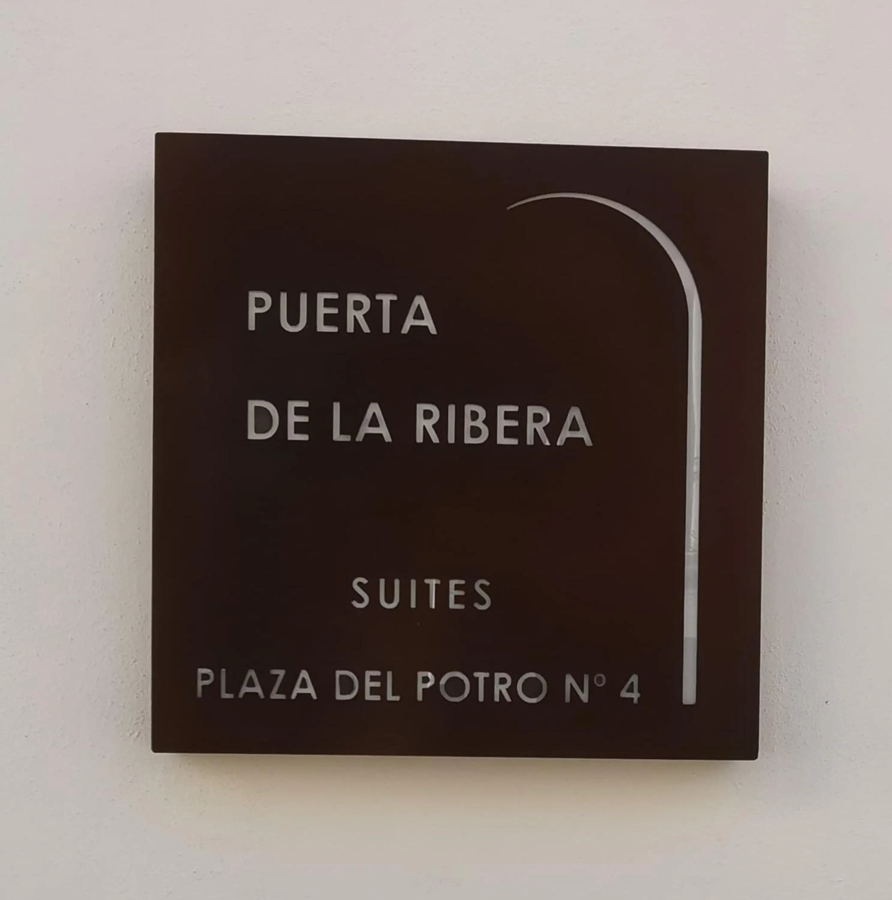 Property logo or sign in Puerta de la Ribera Suites