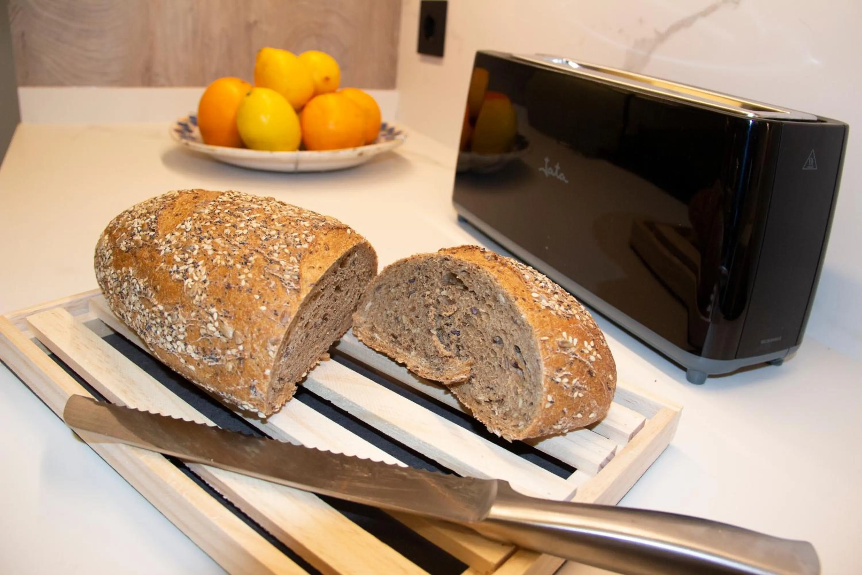 Kitchen or kitchenette in Puerta de la Ribera Suites