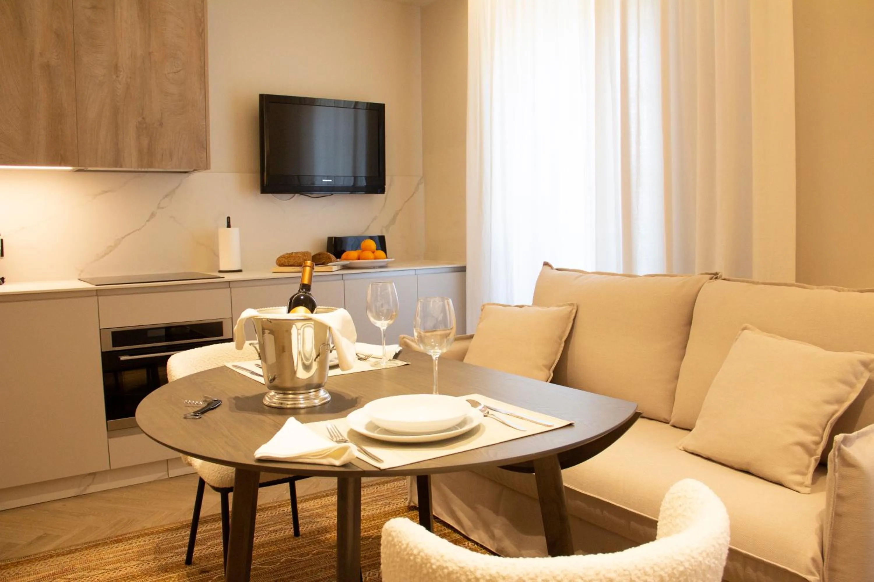 Kitchen or kitchenette in Puerta de la Ribera Suites