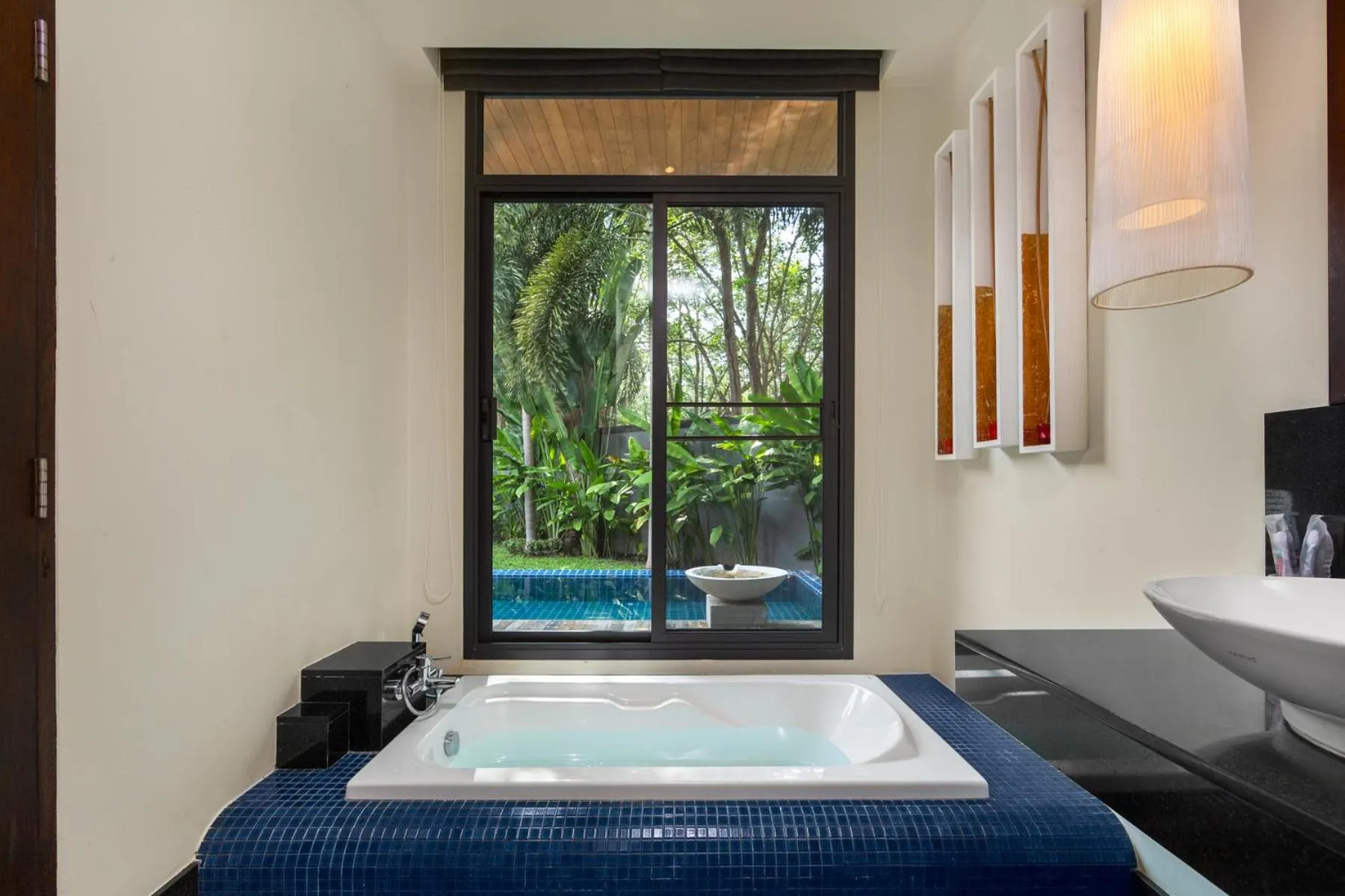 Bathroom in Saiyuan Estate by TropicLook