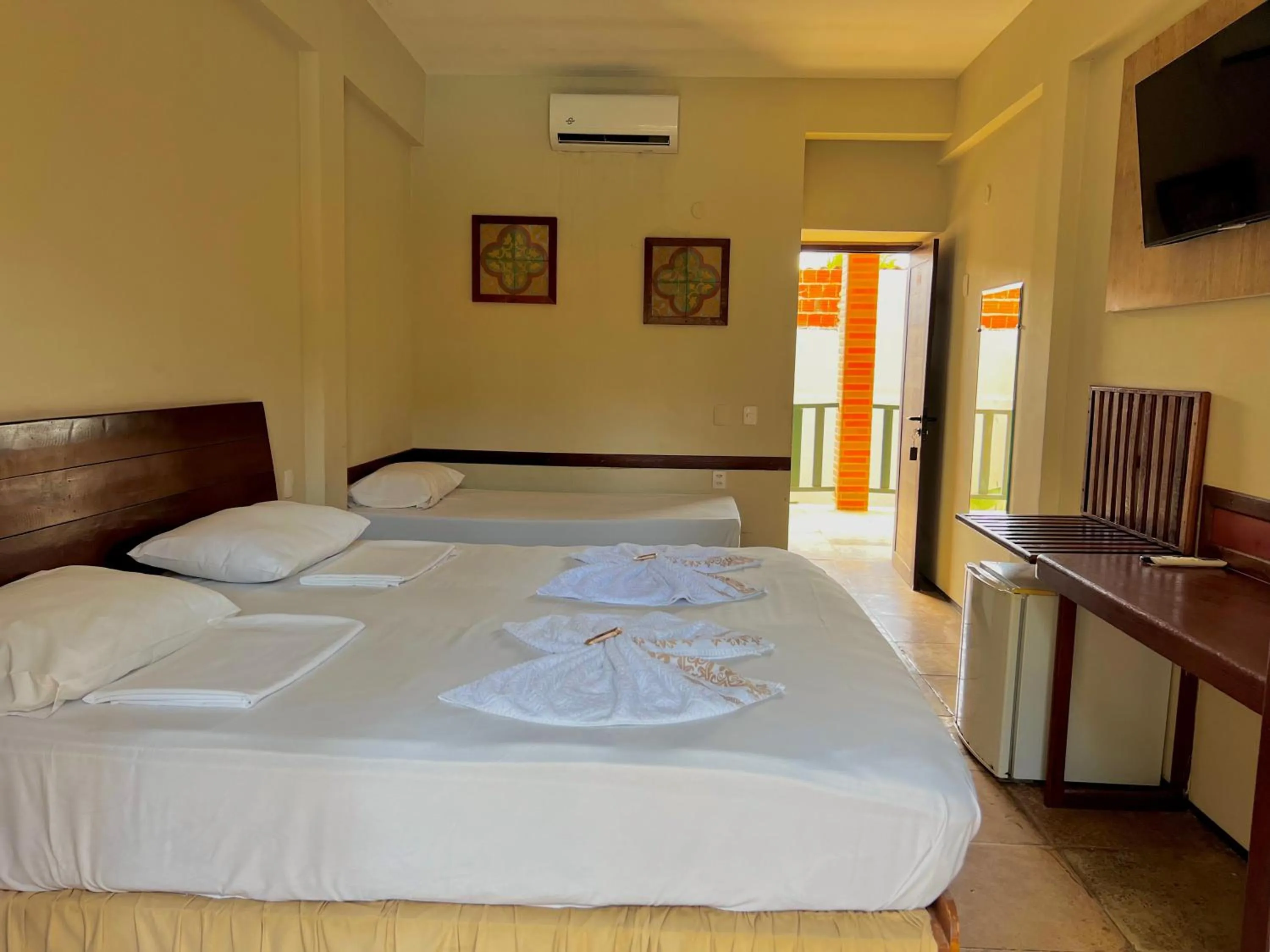 Bed in Porto Futuro Hotel