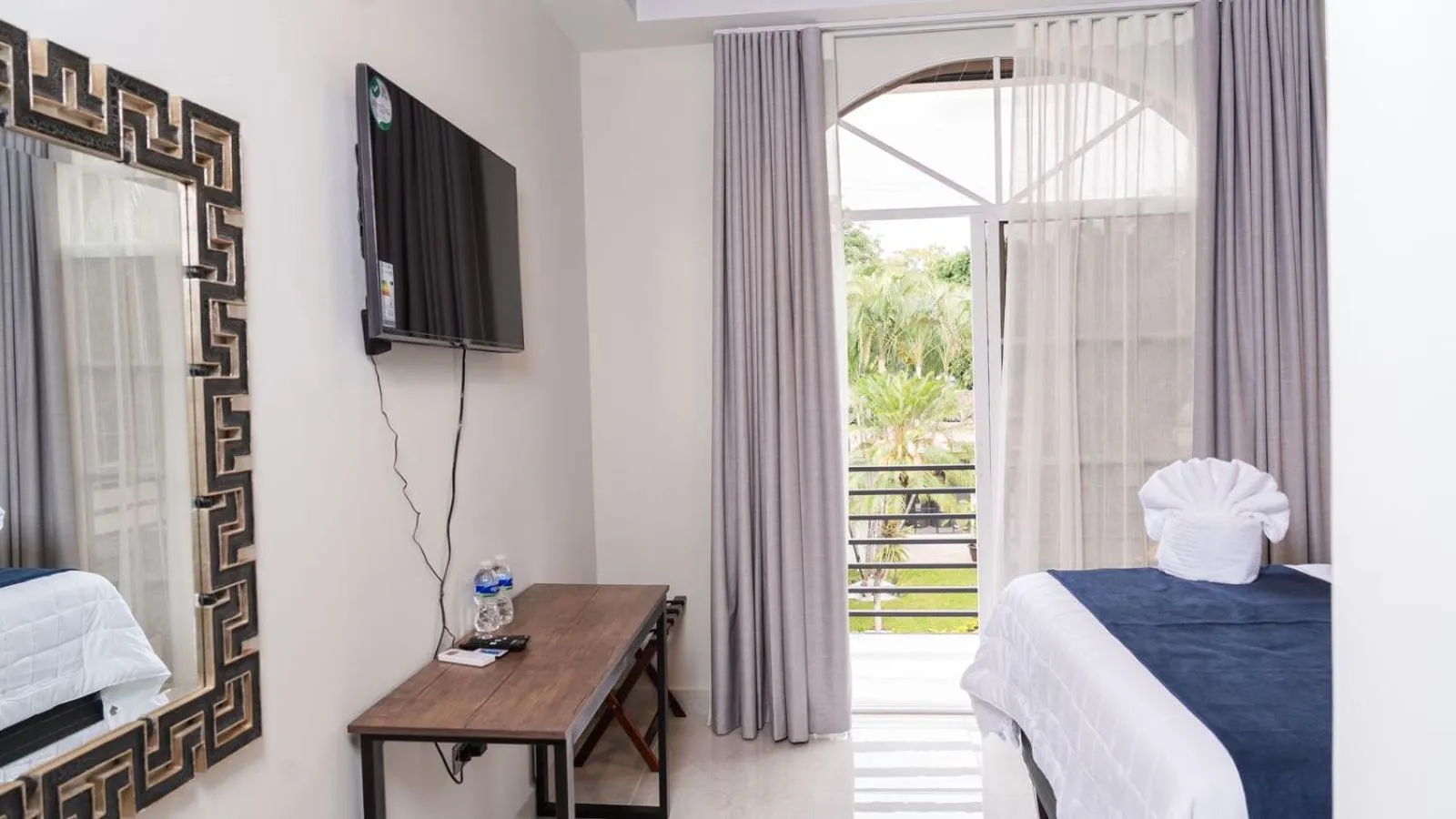 View (from property/room), Bed in Hotel Boutique Nueva Valladolid