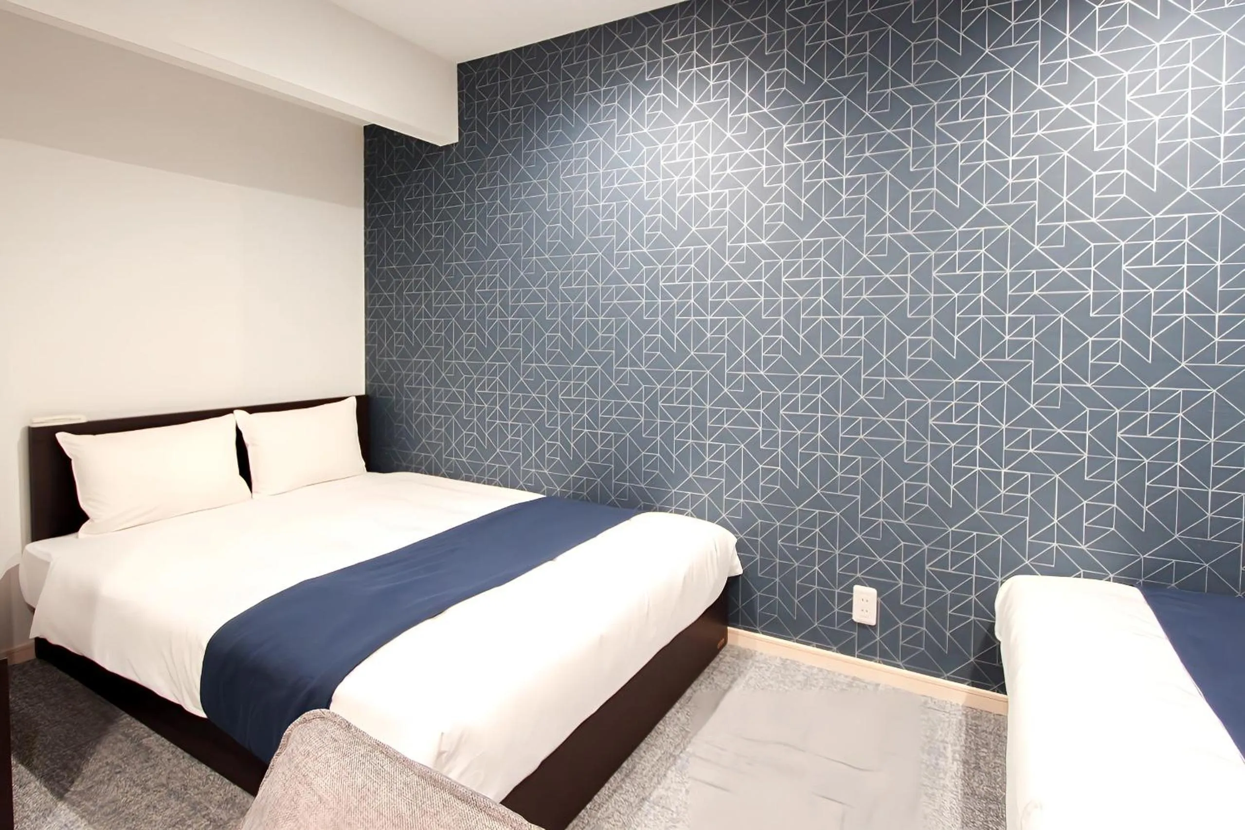 Bed in Hotel SALIFORT HAKATA