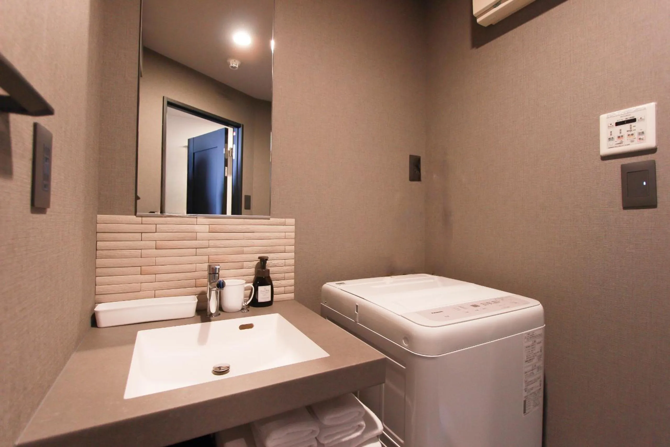 washing machine in 慶 -Kei- HOTEL AND APARTMENT