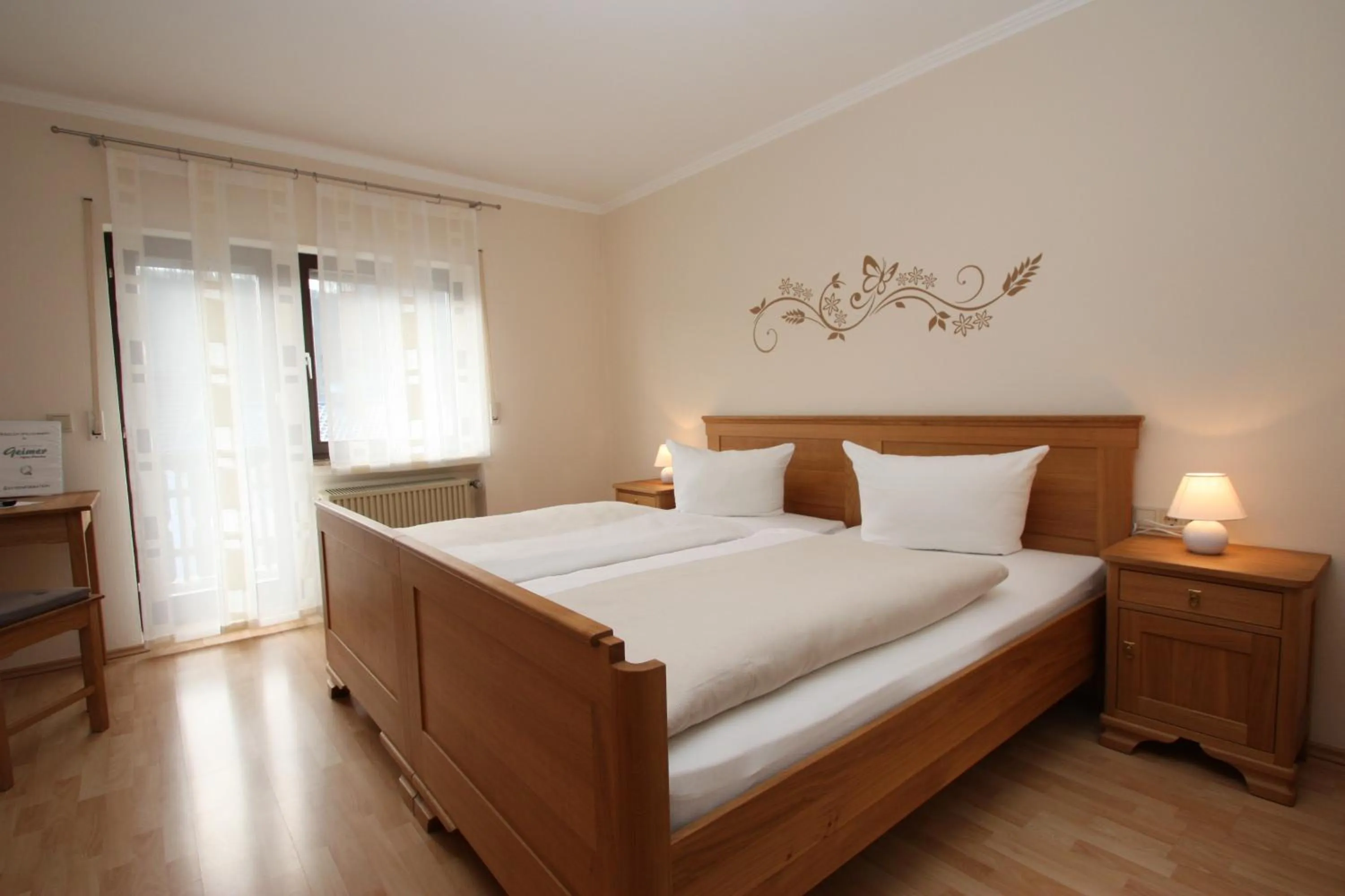 Photo of the whole room, Bed in Gasthaus Pension Geimer