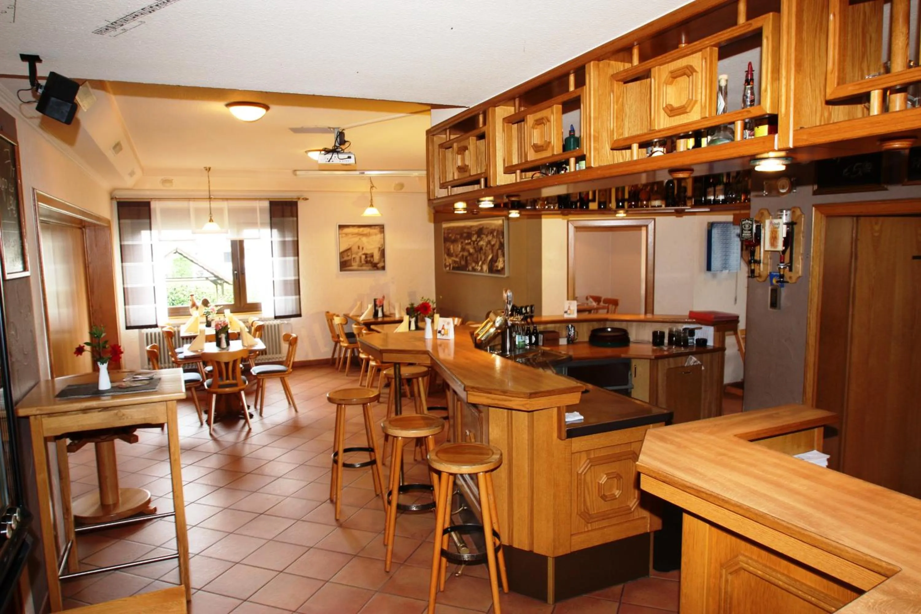 Communal lounge/ TV room in Gasthaus Pension Geimer