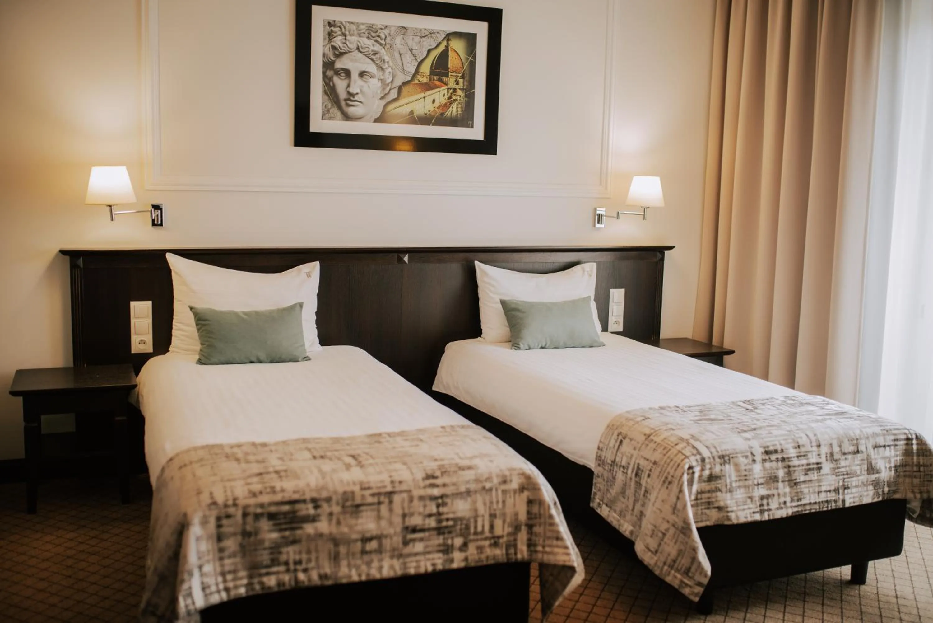 Bed in Hotel Toscania