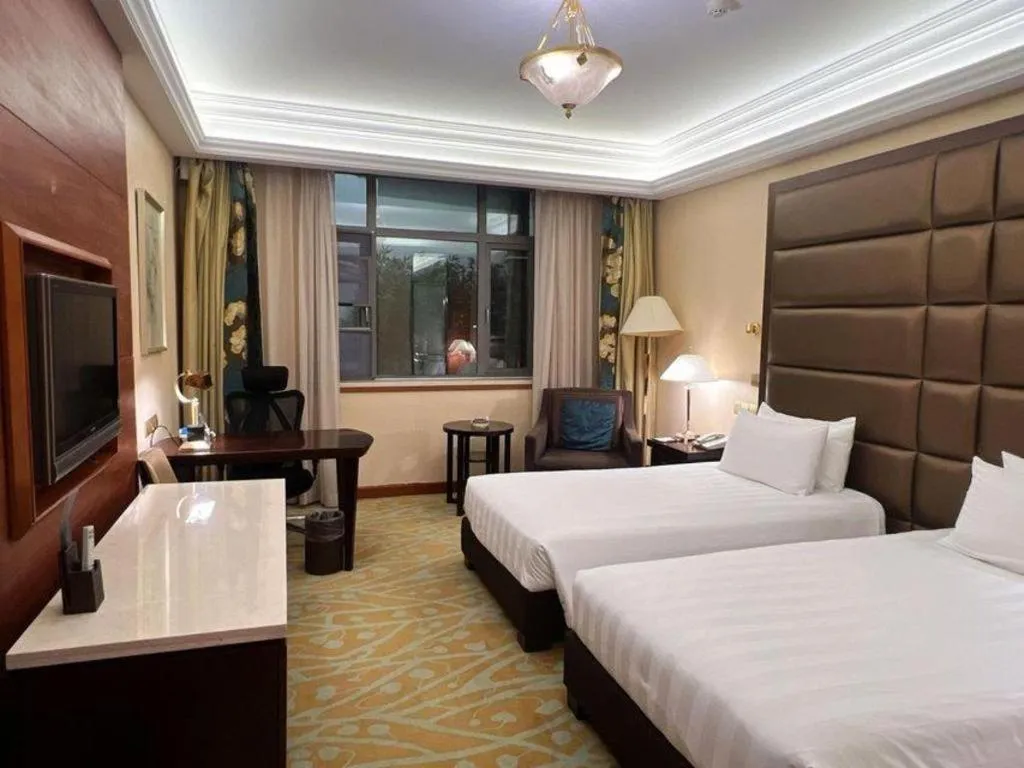 Bed in Sichuan Jinjiang Hotel