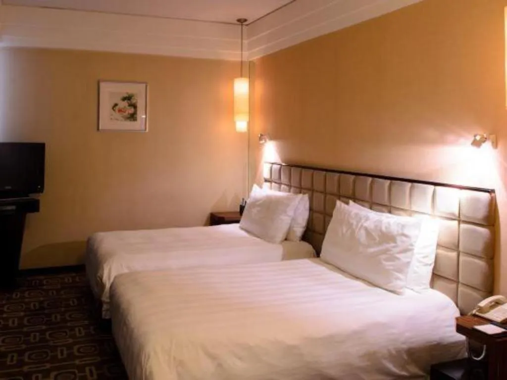 Bed in Sichuan Jinjiang Hotel