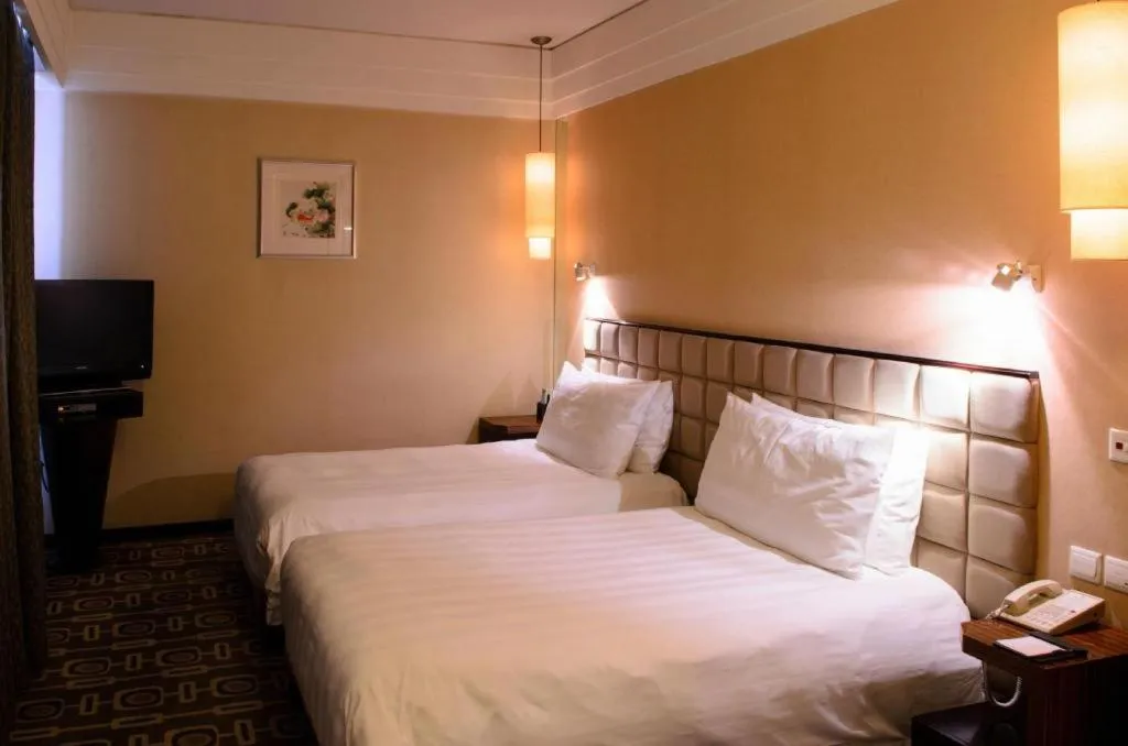 Bed in Sichuan Jinjiang Hotel