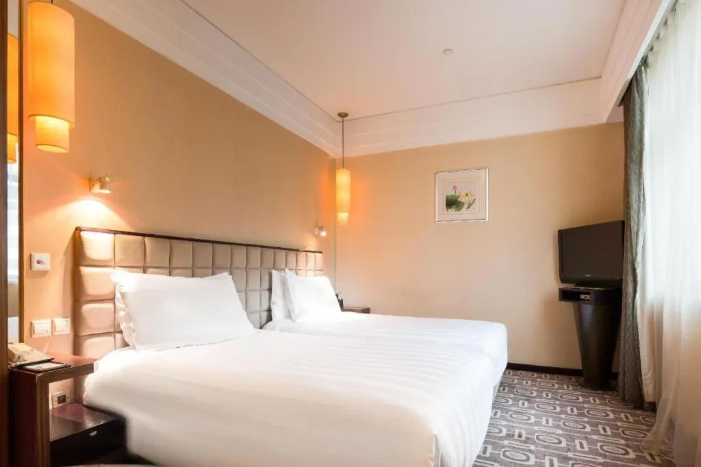 Bed in Sichuan Jinjiang Hotel