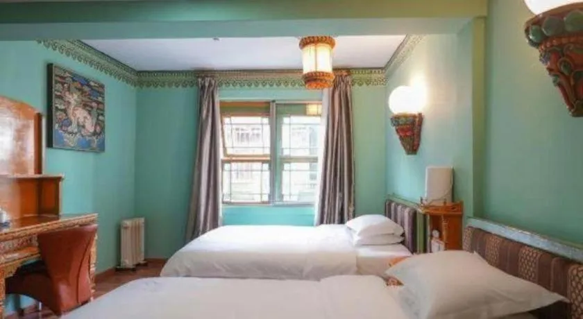 Bed in Tashitakge Hotel