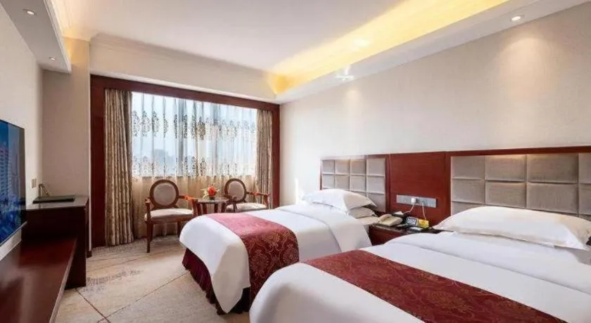 Bed in Overseas Chinese Hotel