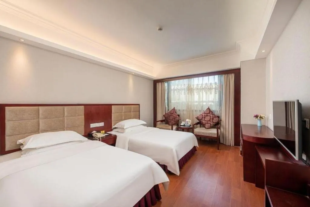 Bed in Overseas Chinese Hotel