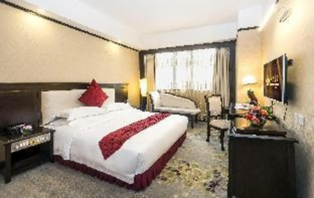 Bed in Overseas Chinese Hotel